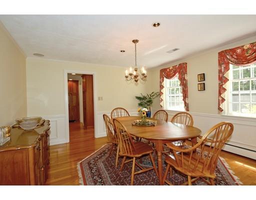855 Boston Post Road Weston, MA 02493 - Photo 9 of 18 a view of a dining room with furniture and chandelier