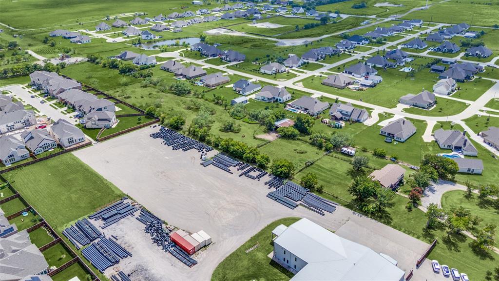 16777 John Wiley Road Justin, TX 76247 - Photo 15 of 16 an aerial view of a residential houses with outdoor space
