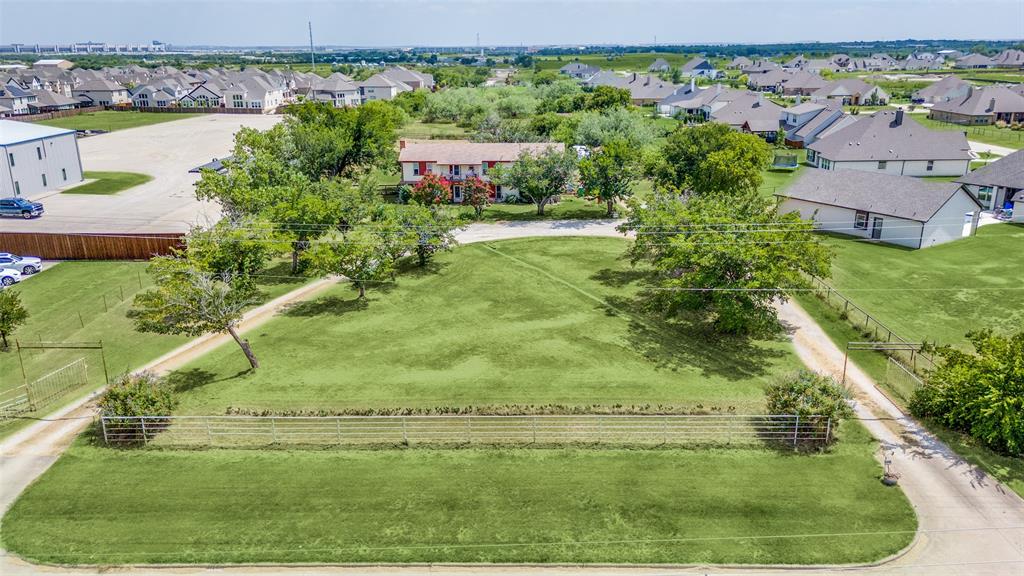 16777 John Wiley Road Justin, TX 76247 - Photo 2 of 16 an aerial view of residential houses with outdoor space