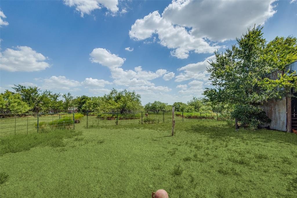 16777 John Wiley Road Justin, TX 76247 - Photo 10 of 16 a view of a golf course with a lake