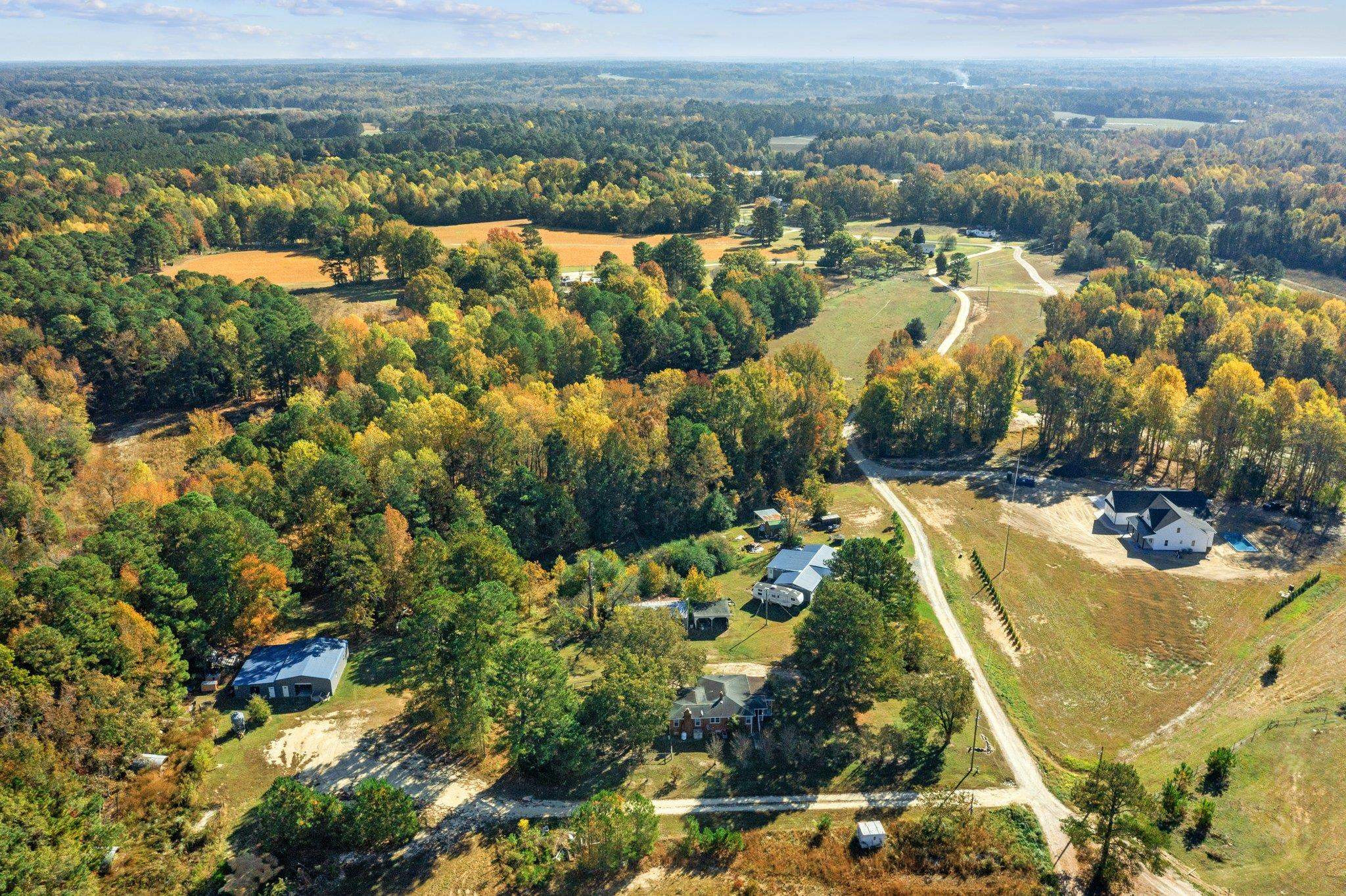 3605 Buzzard Road Wendell, NC 27591 - Photo 15 of 25 an aerial view of residential houses with outdoor space