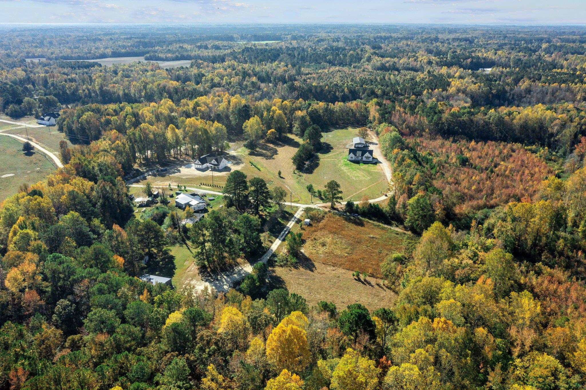 3605 Buzzard Road Wendell, NC 27591 - Photo 18 of 25 an aerial view of a houses with a yard