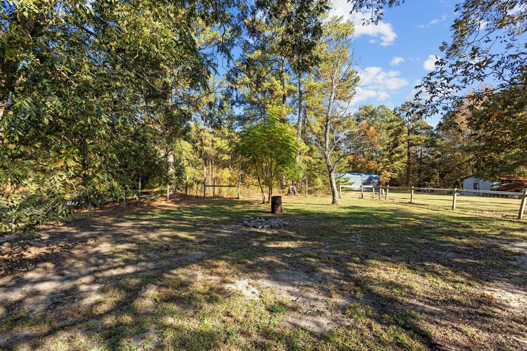 3605 Buzzard Road Wendell, NC 27591 - Photo 20 of 25 a view of a yard with trees