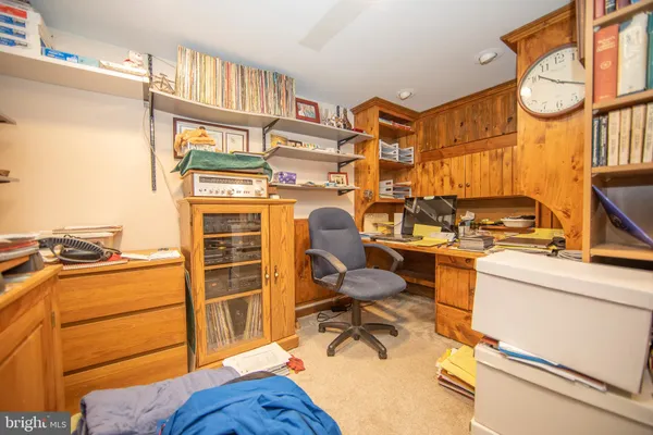a view of a workspace with furniture