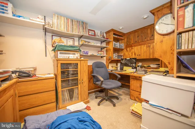 a view of a workspace with furniture