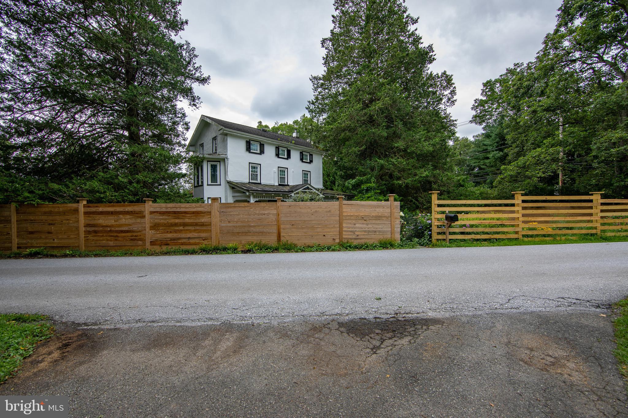 4 Seminary Road Glenmoore, PA 19343 - Photo 2 of 35 a view of a house with a street