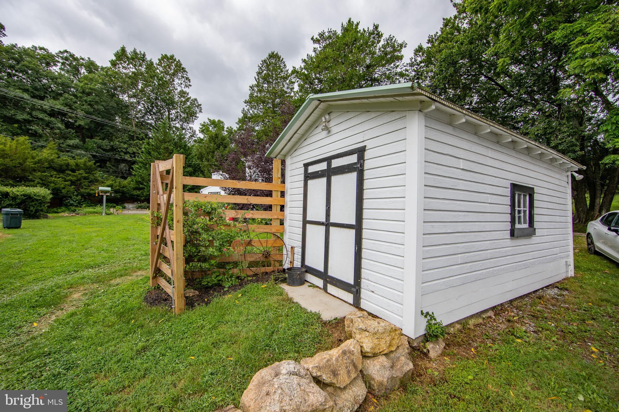 4 Seminary Road Glenmoore, PA 19343 - Photo 22 of 35 a view of backyard with wooden fence and large trees