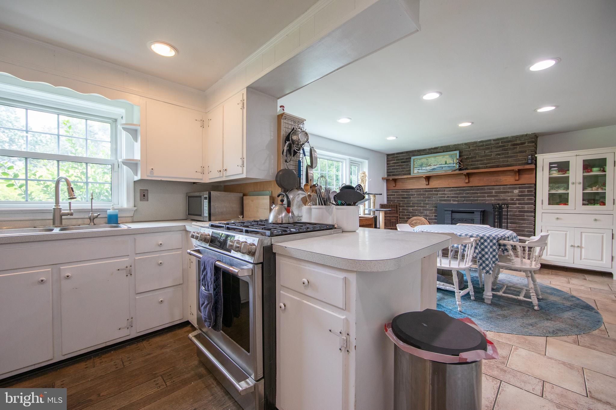 4 Seminary Road Glenmoore, PA 19343 - Photo 3 of 35 a kitchen with a stove a sink and a refrigerator