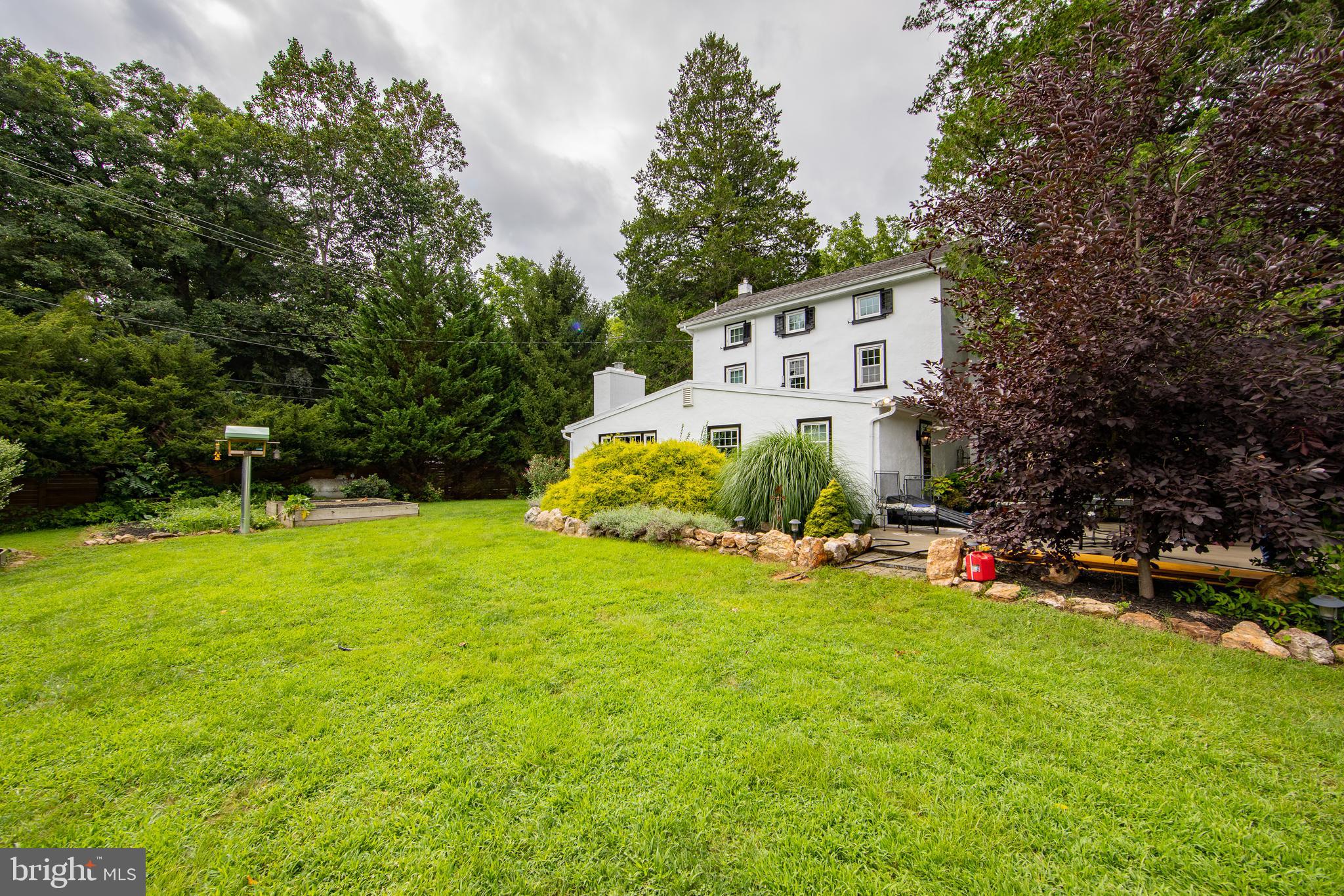 4 Seminary Road Glenmoore, PA 19343 - Photo 32 of 35 a view of a house with a yard and sitting area