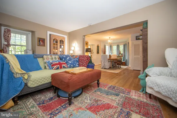 a living room with furniture and a rug
