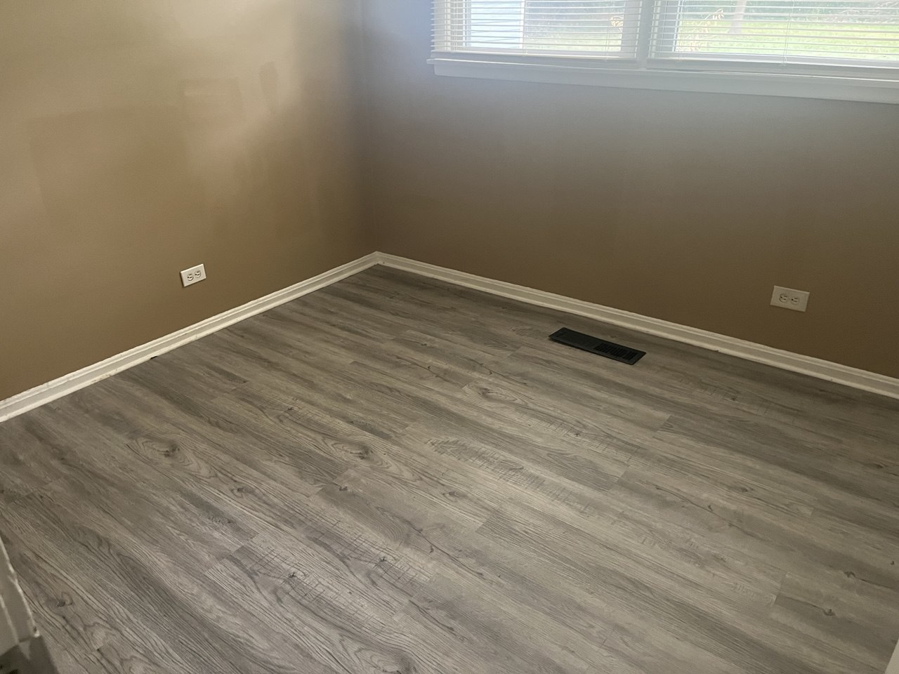4741 183rd Street Country Club Hills, IL 60478 - Photo 12 of 18 a view of a room with wooden floor and a window
