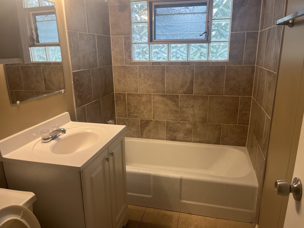 4741 183rd Street Country Club Hills, IL 60478 - Photo 15 of 18 a bathroom with a sink and a bathtub