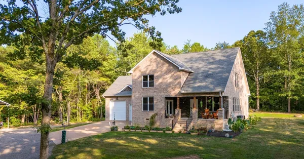 a front view of house with yard