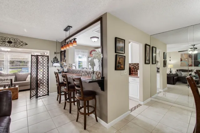 a view of a living room and dining room