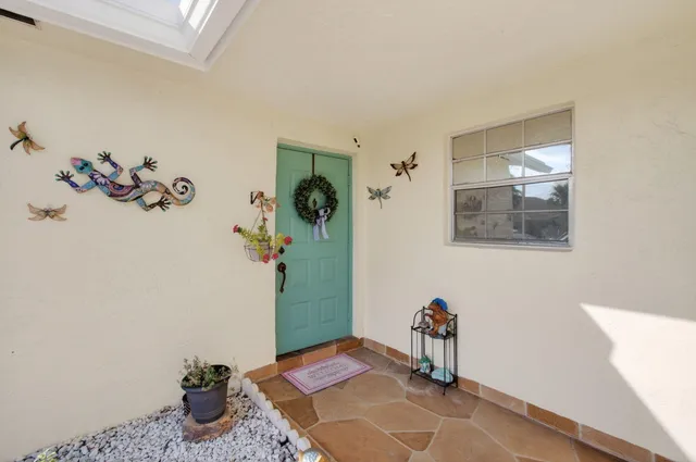 a bedroom with a bed and the wall