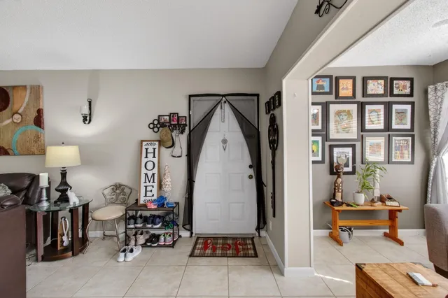 a view of livingroom with furniture and white walls