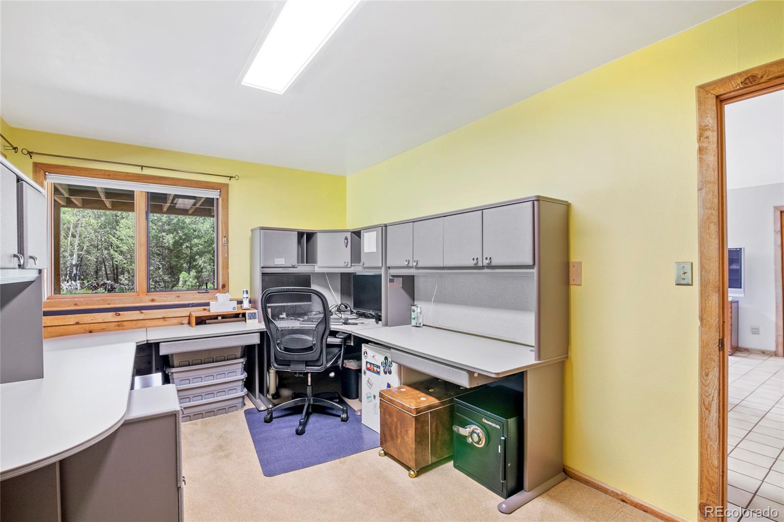 444 Nova Road Pine, CO 80470 - Photo 25 of 40 a workspace with furniture and window
