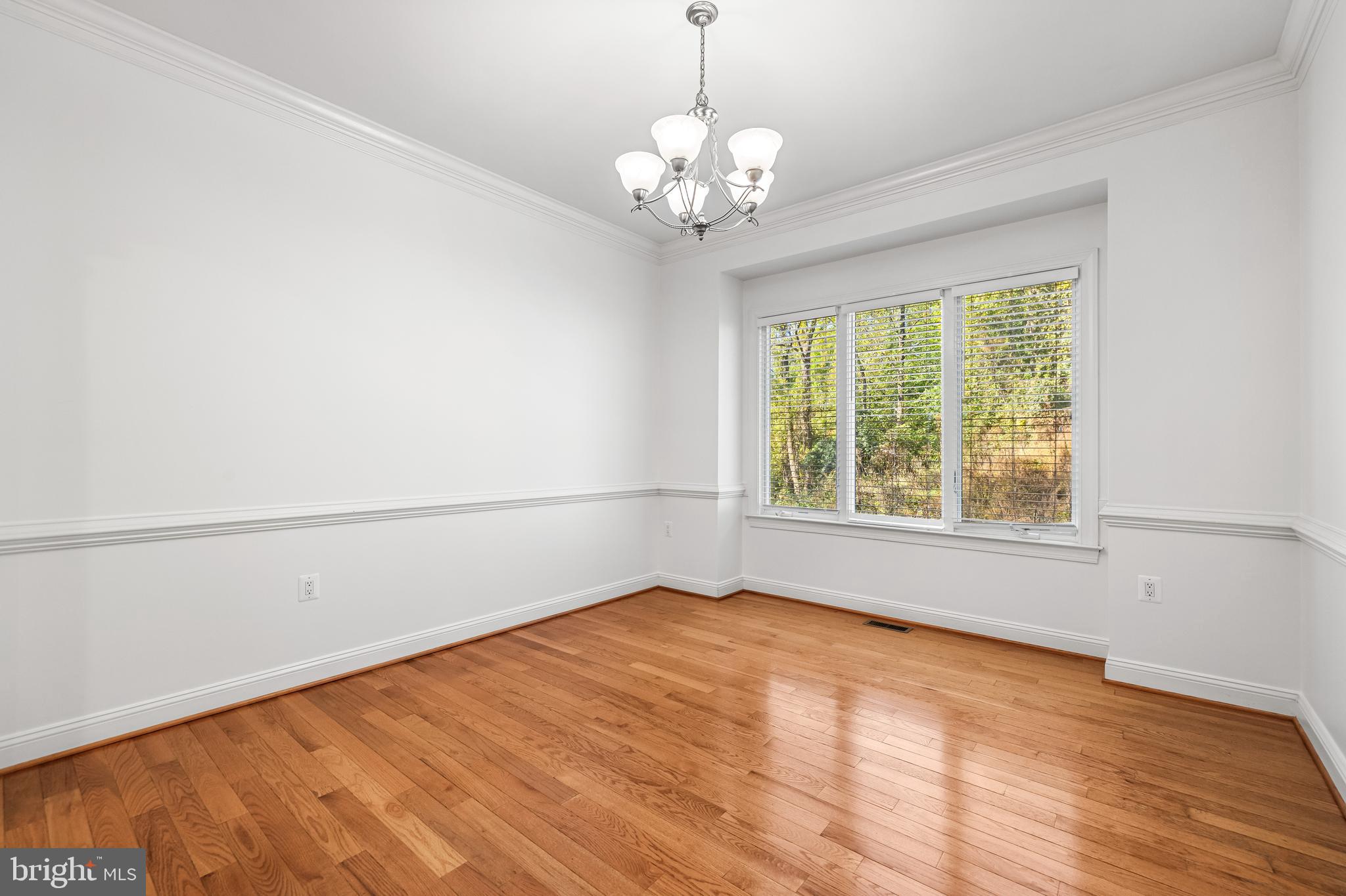 6716 Newstead Lane Baltimore, MD 21209 - Photo 11 of 66 a view of empty room with window