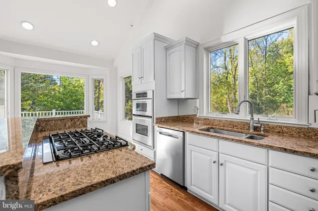 a bathroom with a bath tub and shower