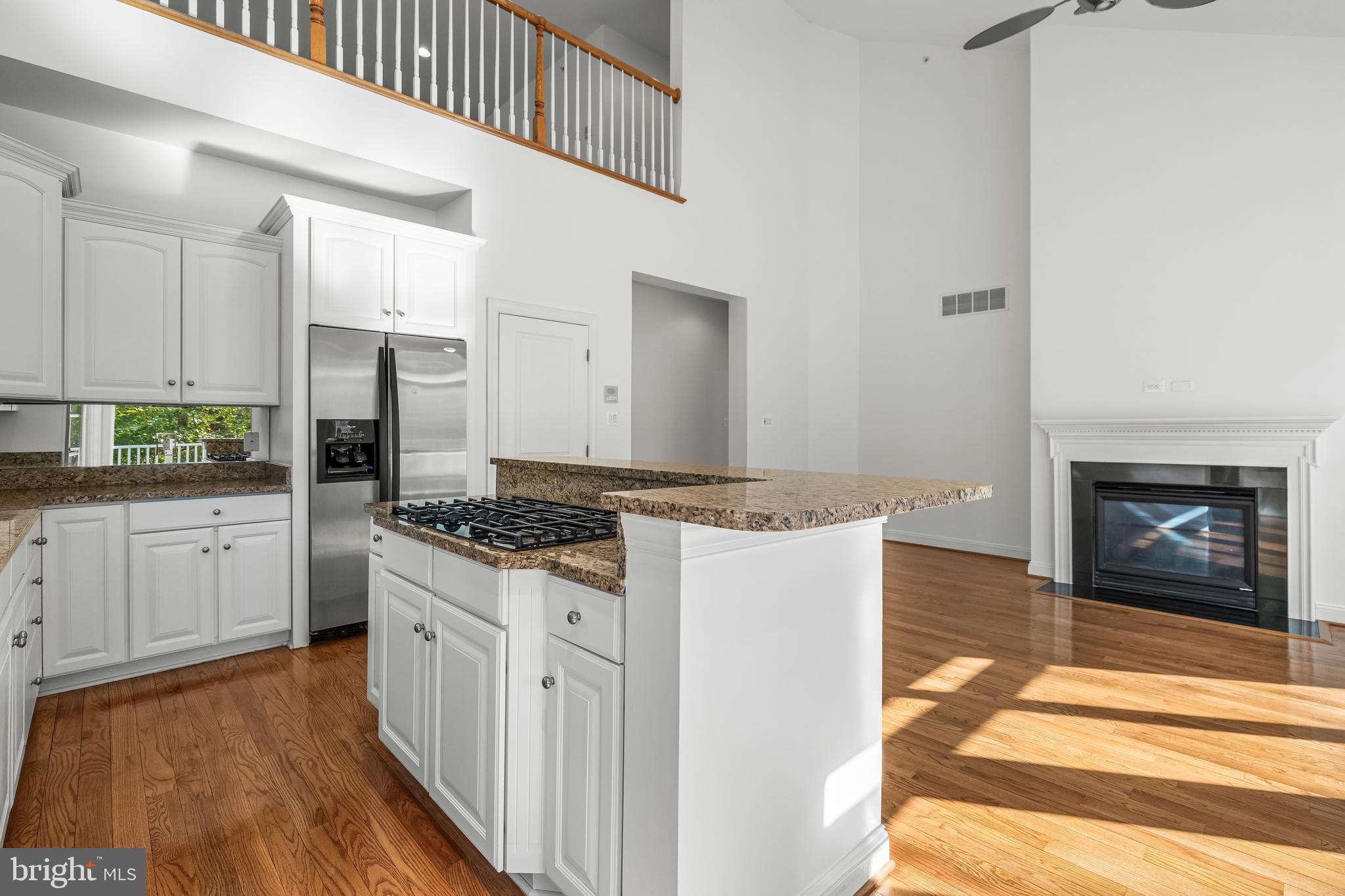 6716 Newstead Lane Baltimore, MD 21209 - Photo 28 of 66 a kitchen with stainless steel appliances granite countertop a stove and a refrigerator