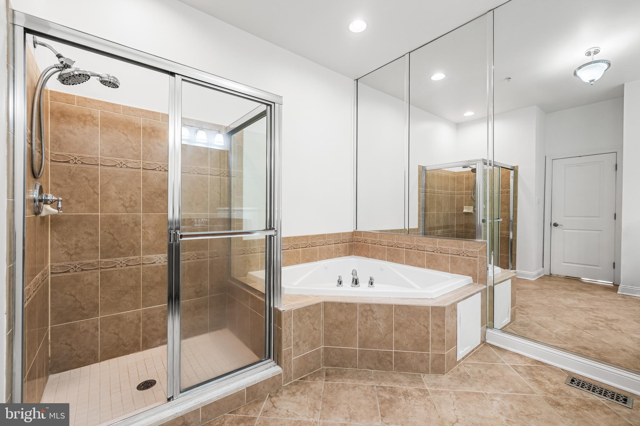 6716 Newstead Lane Baltimore, MD 21209 - Photo 36 of 66 a bathroom with a bath tub and shower