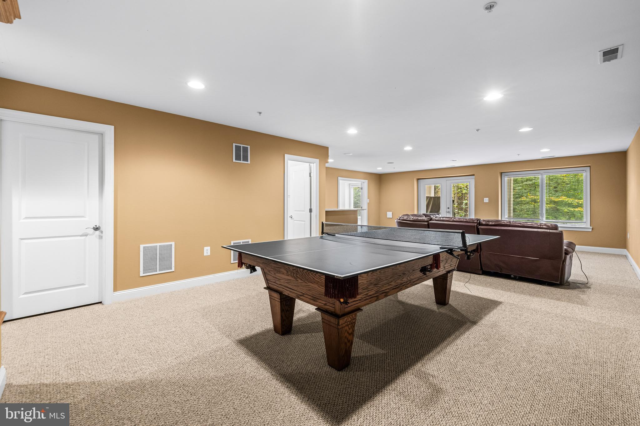 6716 Newstead Lane Baltimore, MD 21209 - Photo 55 of 66 a living room with furniture a table and a potted plant