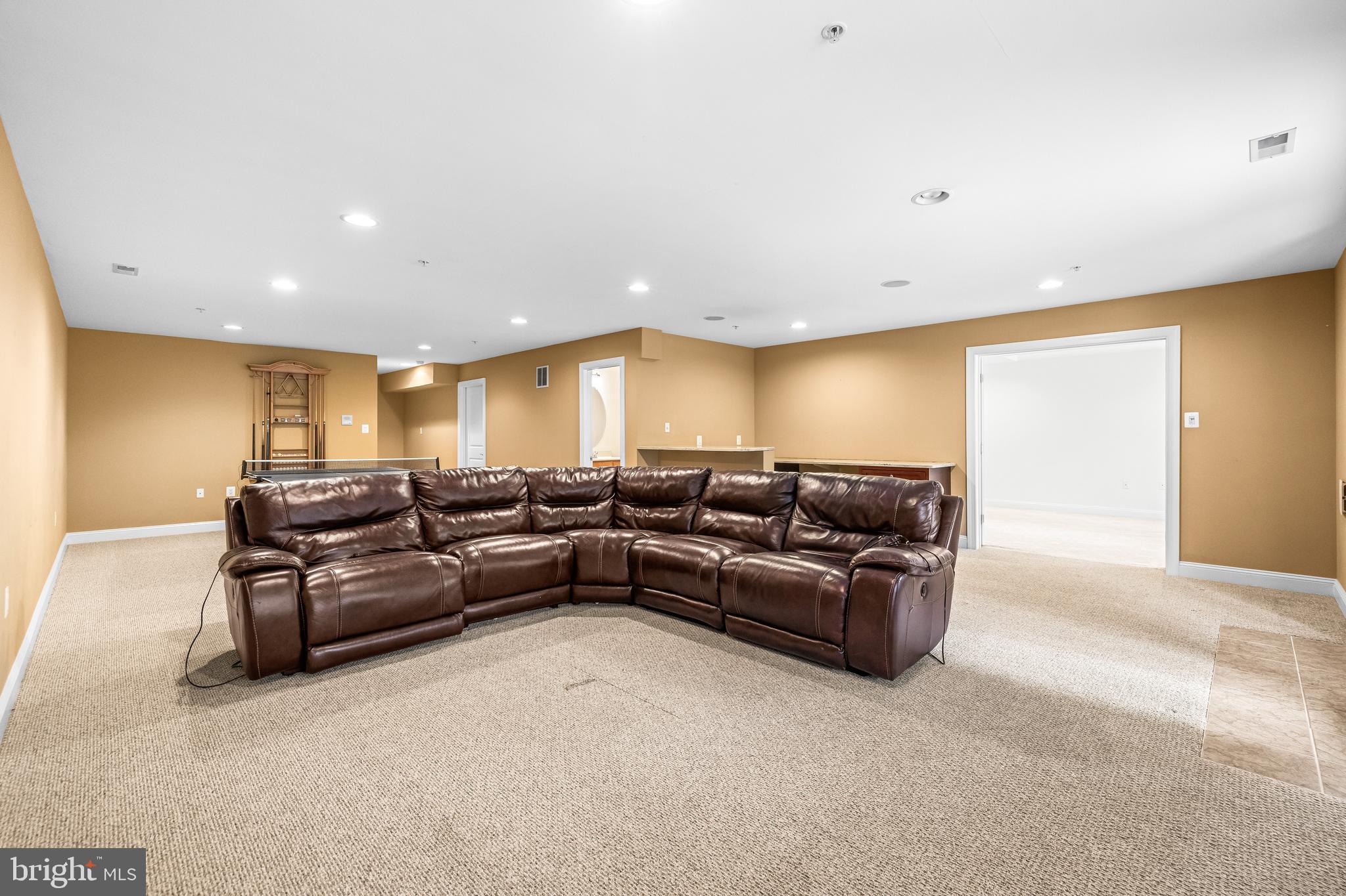 6716 Newstead Lane Baltimore, MD 21209 - Photo 56 of 66 a living room with a couch and a coffee table
