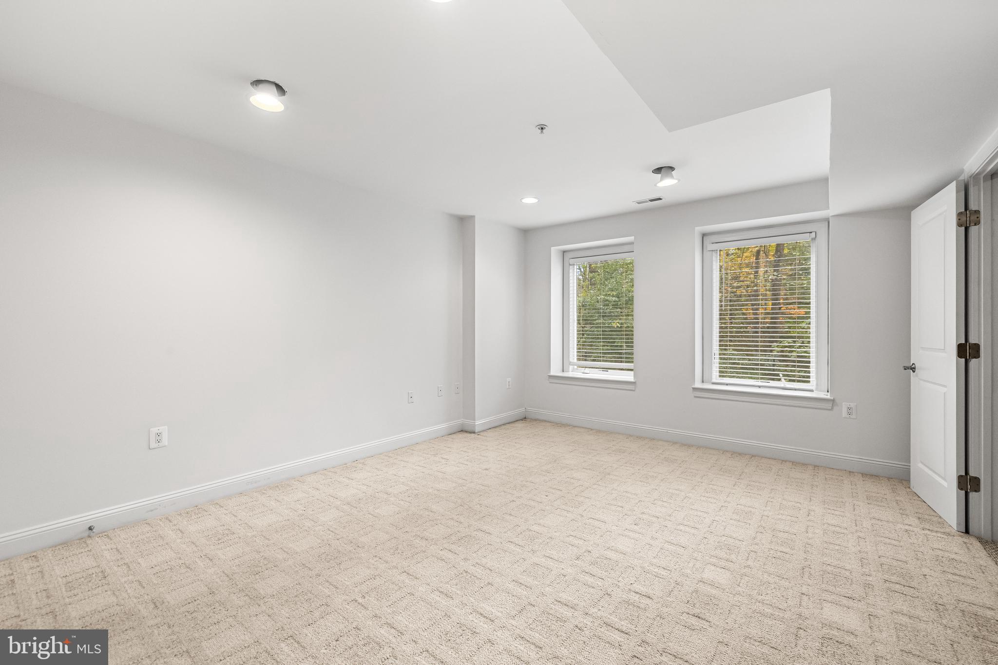 6716 Newstead Lane Baltimore, MD 21209 - Photo 59 of 66 a view of an empty room with a window