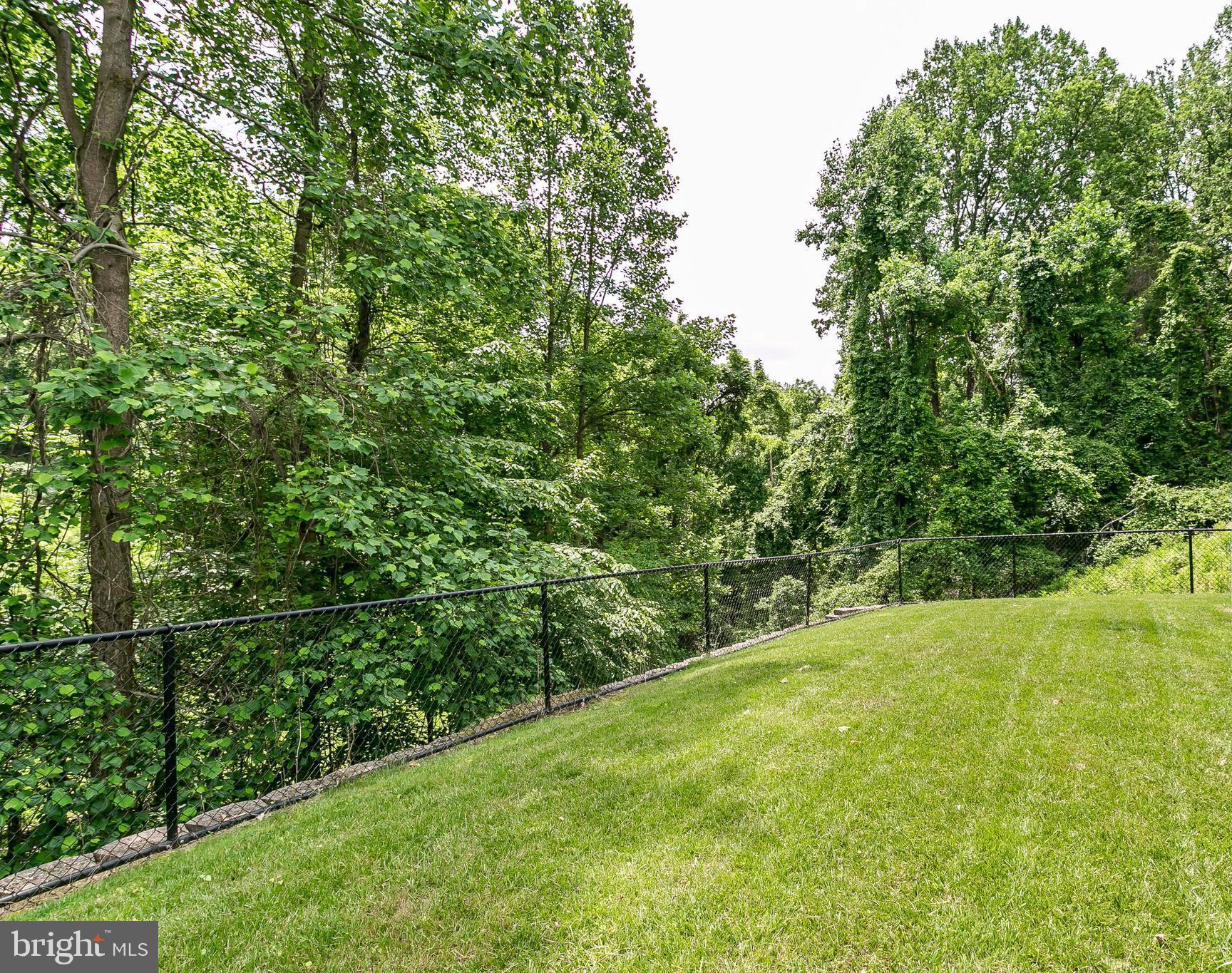 6716 Newstead Lane Baltimore, MD 21209 - Photo 65 of 66 a view of a yard with an outdoor space