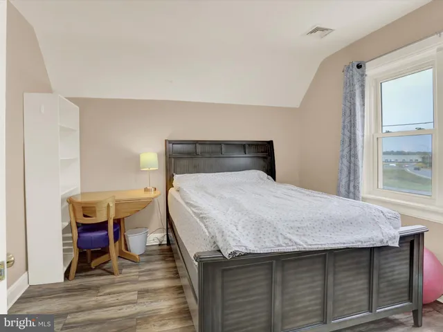 a view of kitchen island with wooden floor