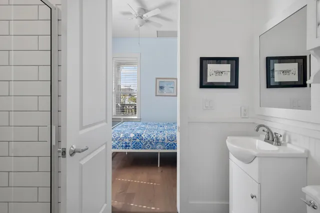 a en suite bathroom with a sink and mirror