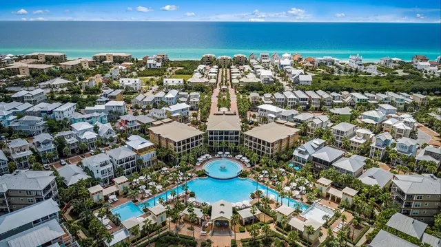 an aerial view of a house with garden space sitting space and swimming pool