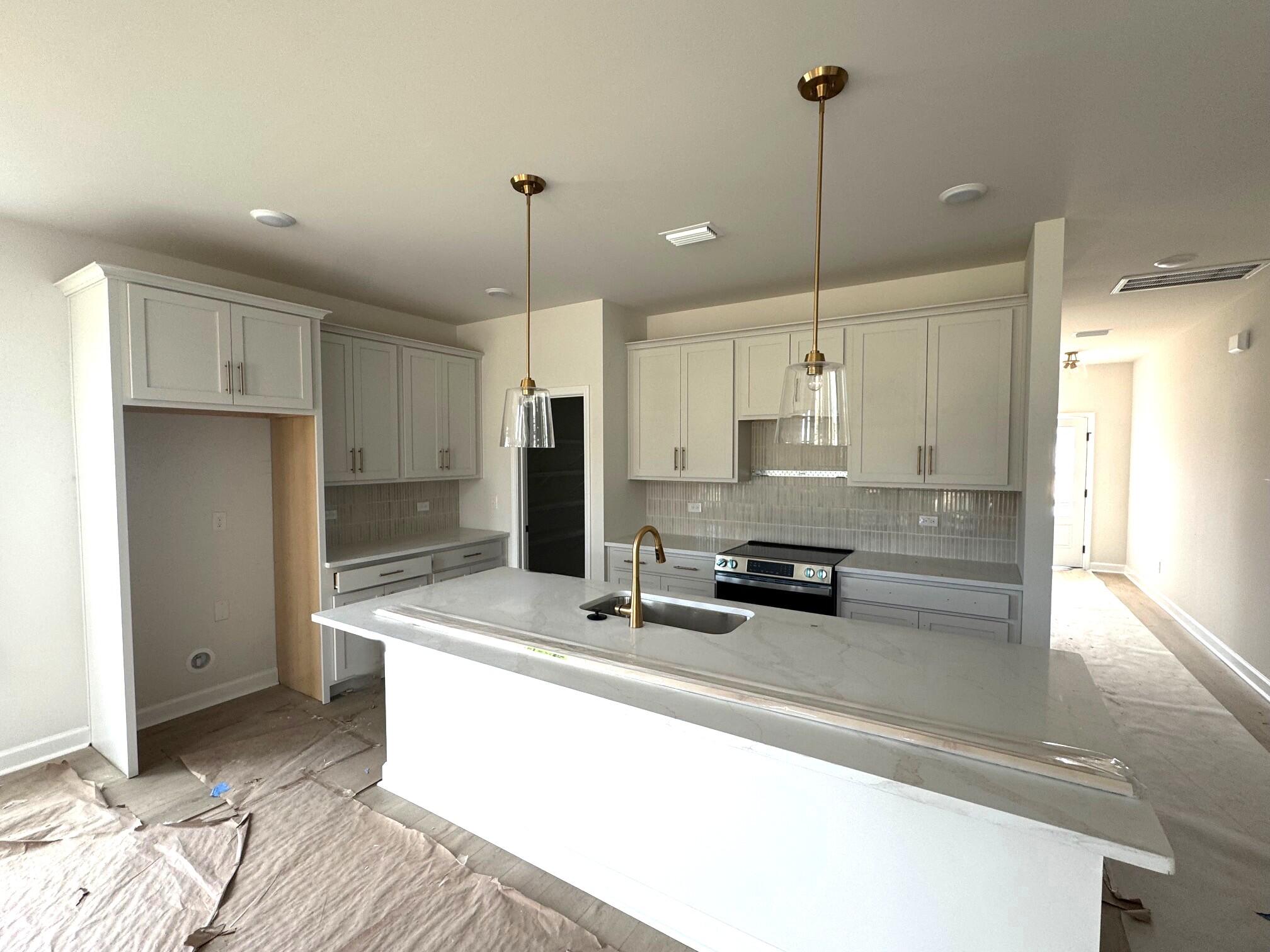 3009 Macaron Court Ravenel, SC 29470 - Photo 9 of 21 98 kitch view 1