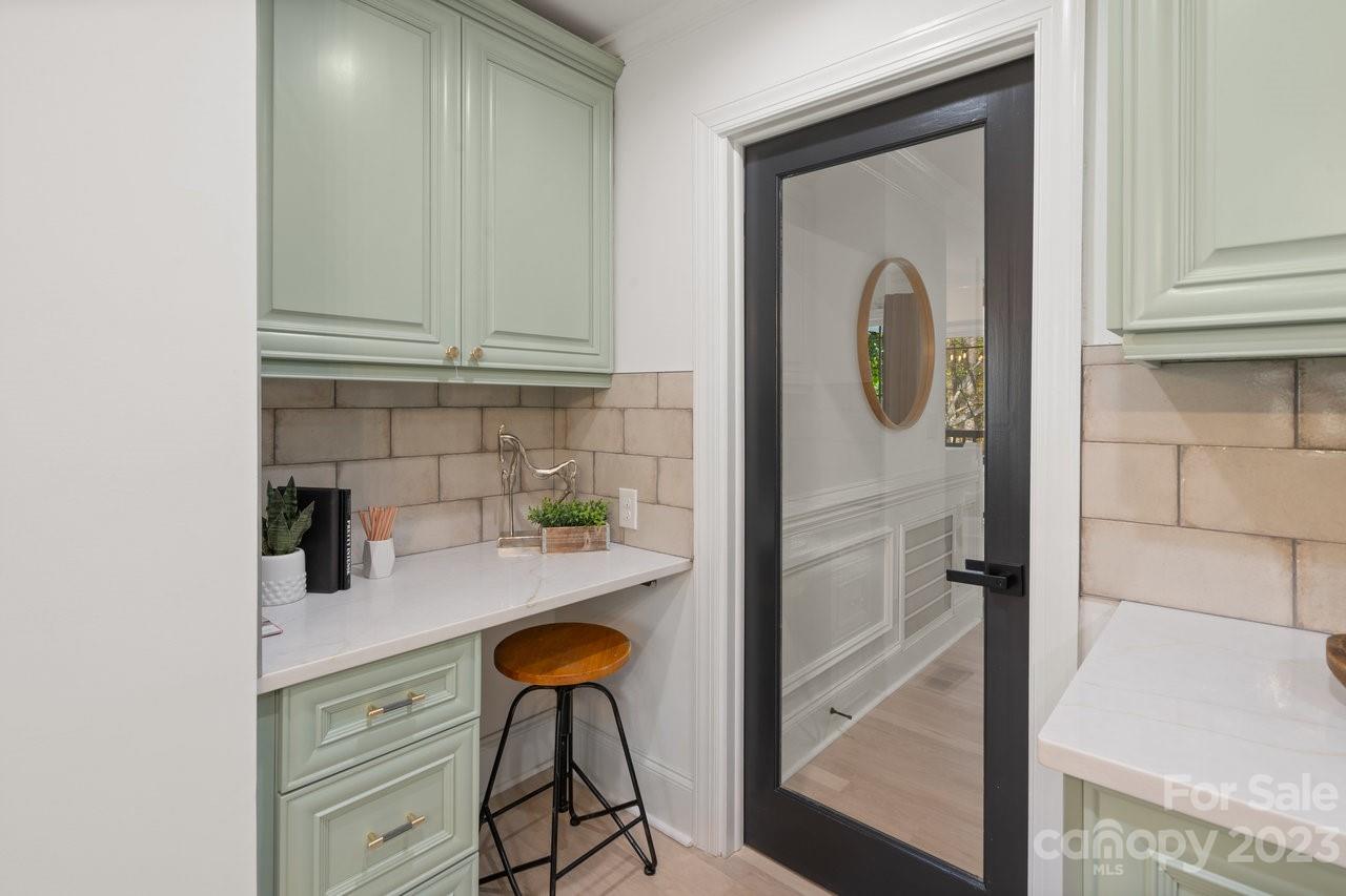 4215 Kuykendall Road Charlotte, NC 28270 - Photo 16 of 43 a kitchen with a refrigerator and a sink
