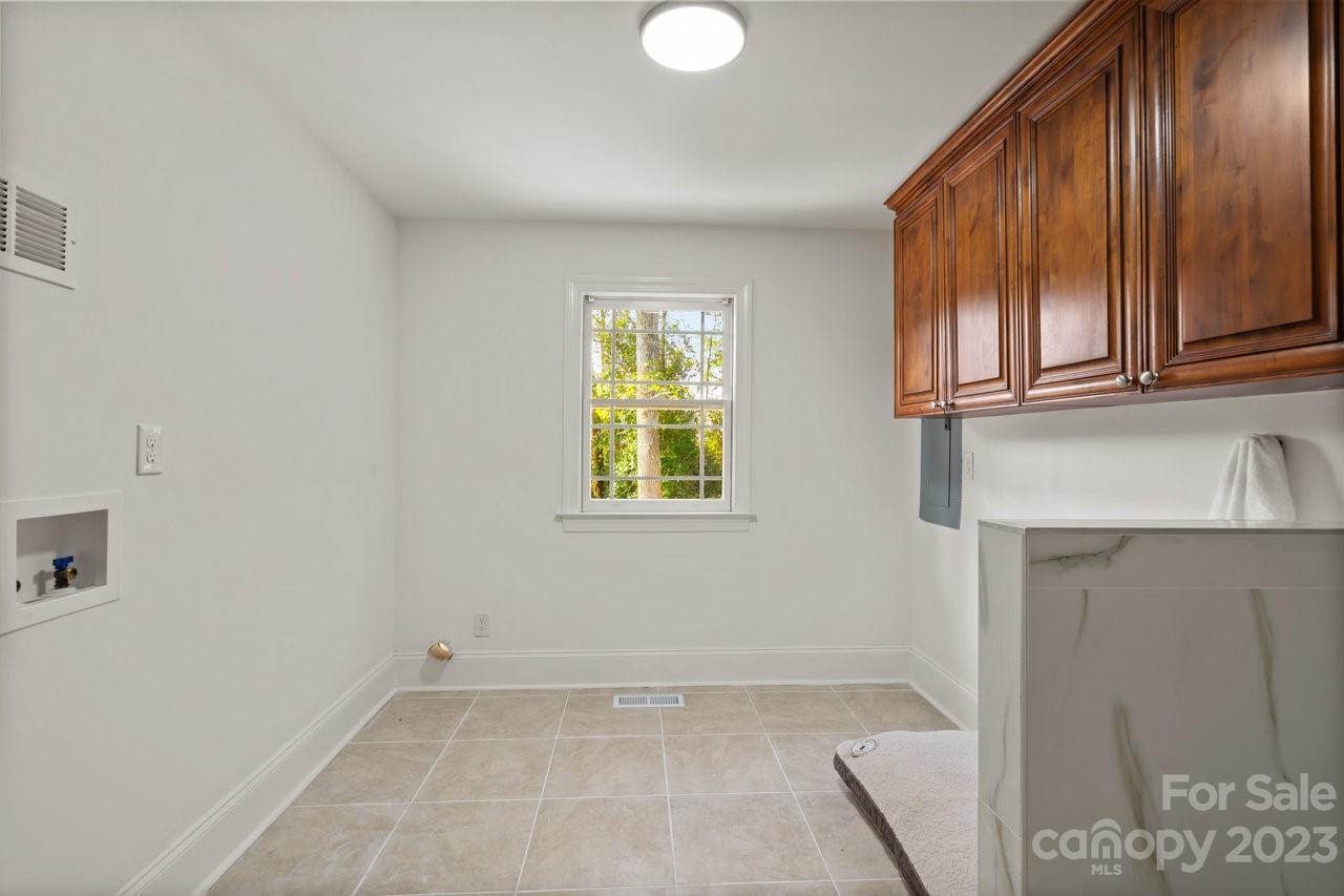 4215 Kuykendall Road Charlotte, NC 28270 - Photo 20 of 43 a view of an empty room with a window