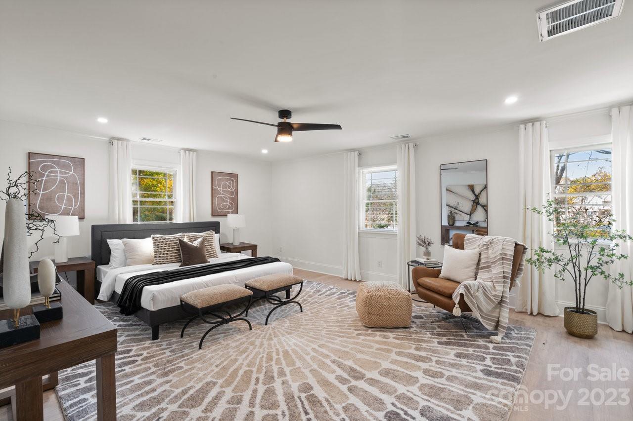 4215 Kuykendall Road Charlotte, NC 28270 - Photo 25 of 43 a living room with furniture and a rug