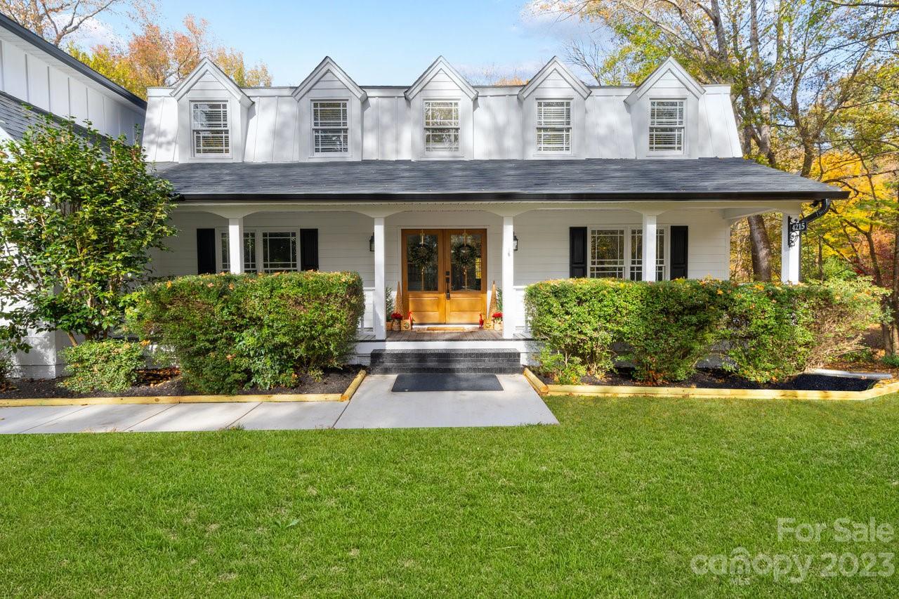 4215 Kuykendall Road Charlotte, NC 28270 - Photo 3 of 43 front view of a house with a yard
