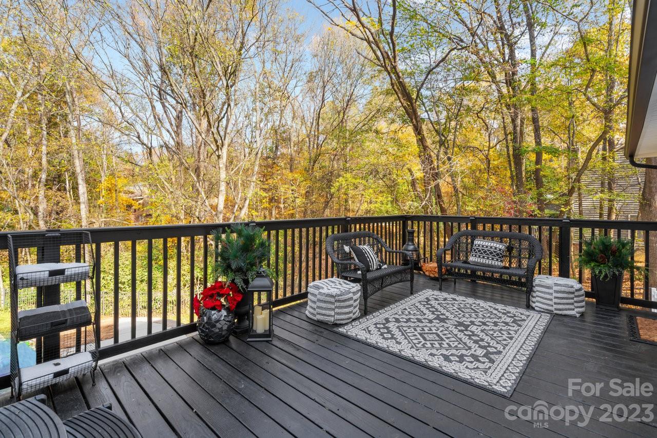 4215 Kuykendall Road Charlotte, NC 28270 - Photo 37 of 43 a balcony with wooden floor and fence