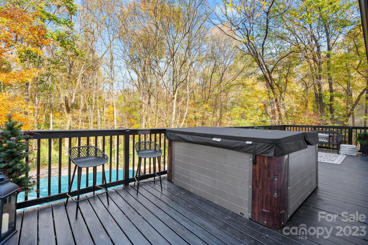 4215 Kuykendall Road Charlotte, NC 28270 - Photo 38 of 43 a view of a wooden bench next to a yard