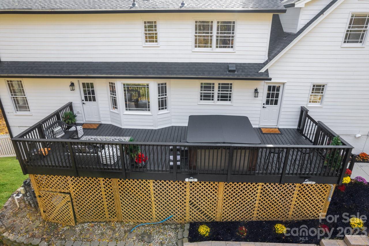 4215 Kuykendall Road Charlotte, NC 28270 - Photo 42 of 43 a view of barbeque with wooden deck and furniture