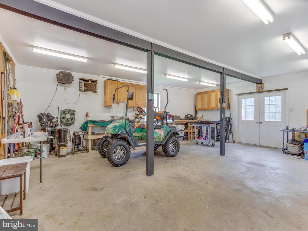 6678 Old Solomons Island Road Friendship, MD 20758 - Photo 53 of 57 a view of a room with gym equipment