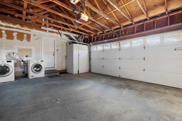 a view of a room with storage and utility room
