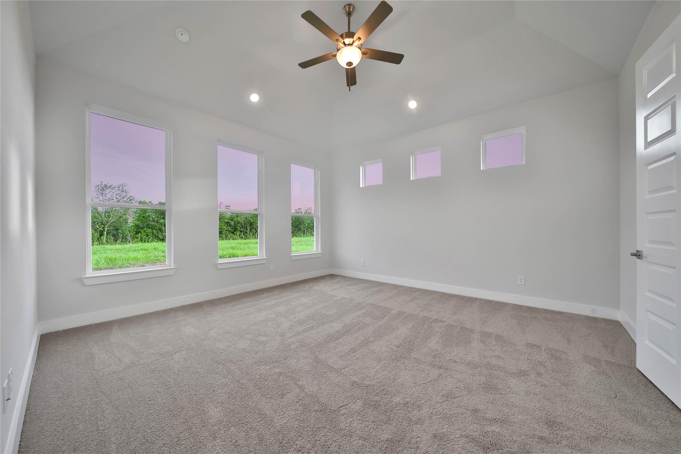 4602 Magnolia Bend Drive Rosharon, TX 77583 - Photo 14 of 39 an empty room with windows and fan