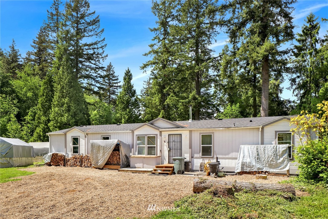 4355 Bridger Road Blaine, WA 98230 - Photo 7 of 12 a view of a house with a yard
