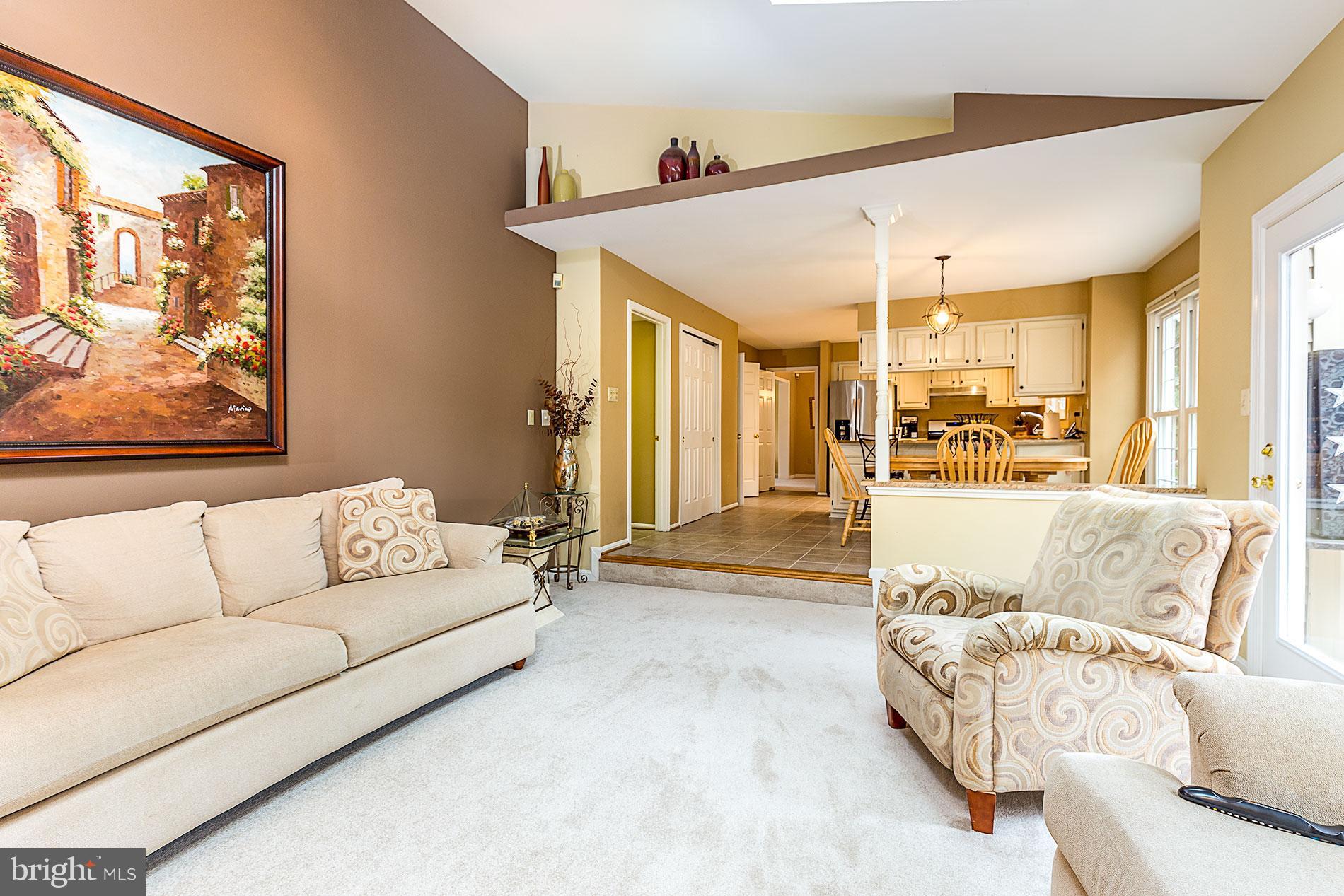 6453 Springhouse Circle Clifton, VA 20124 - Photo 13 of 30 a living room with furniture and a large window