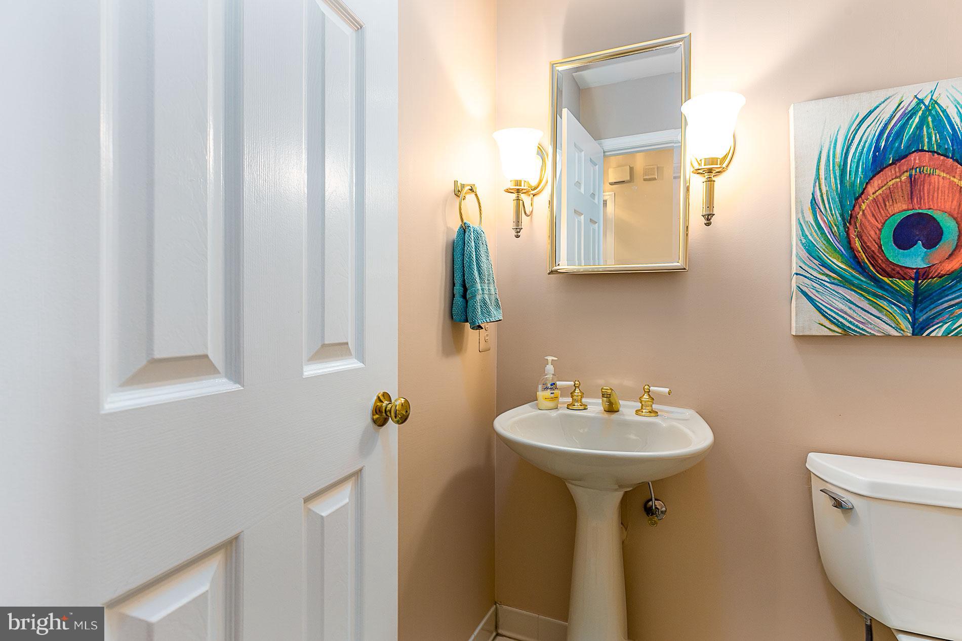 6453 Springhouse Circle Clifton, VA 20124 - Photo 15 of 30 a bathroom with a sink and a mirror