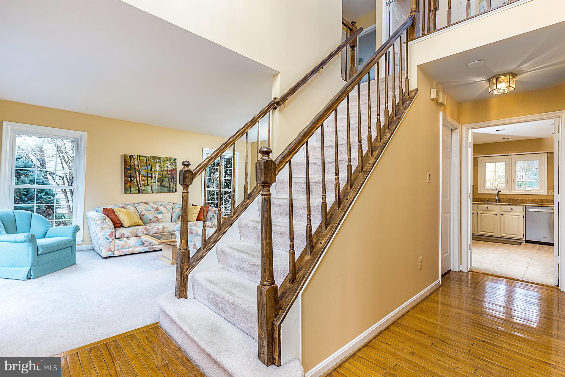 6453 Springhouse Circle Clifton, VA 20124 - Photo 3 of 30 a view of entryway and hall with wooden floor