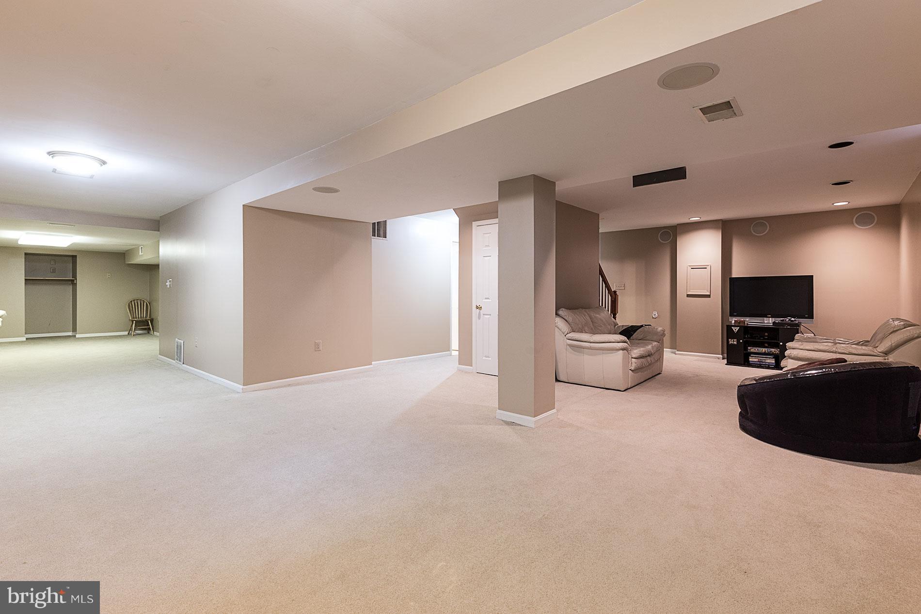 6453 Springhouse Circle Clifton, VA 20124 - Photo 25 of 30 a view of a livingroom with furniture and a flat screen tv