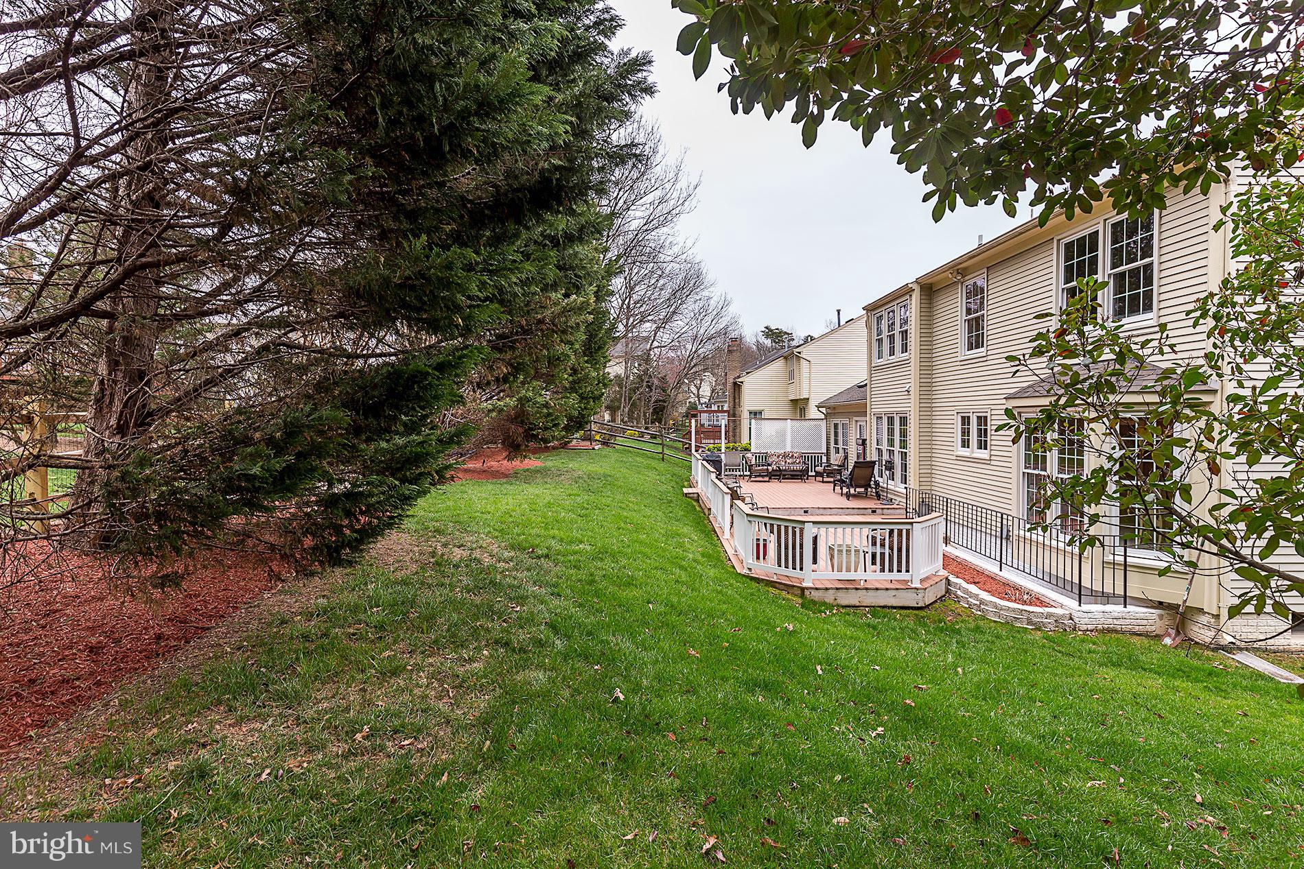 6453 Springhouse Circle Clifton, VA 20124 - Photo 29 of 30 a view of a house with a yard porch and sitting area