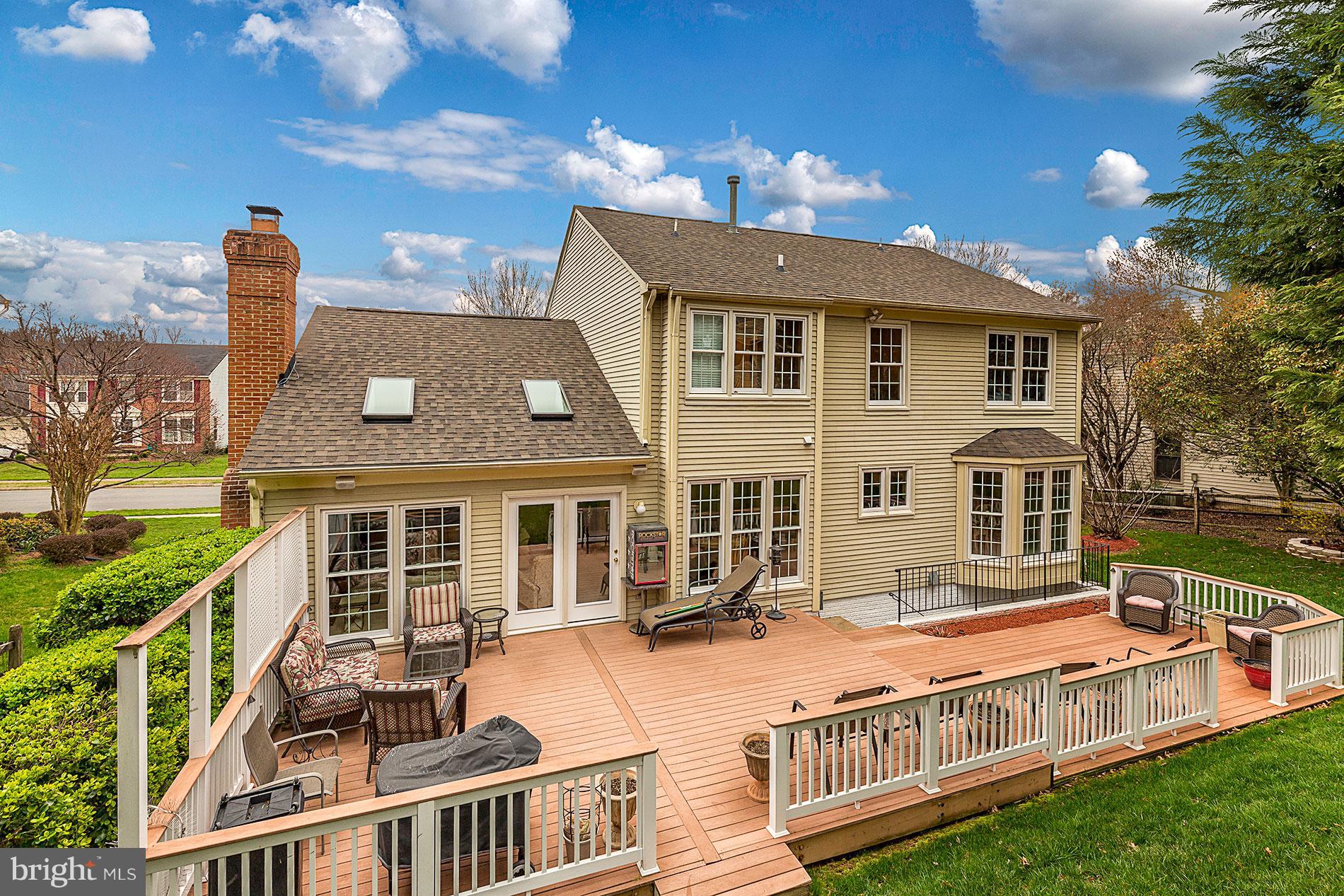 6453 Springhouse Circle Clifton, VA 20124 - Photo 30 of 30 a view of a house with a backyard